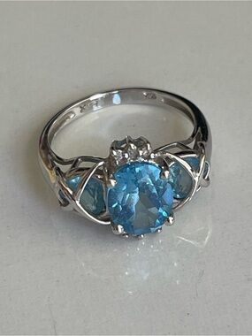 10k solid gold blue topaz and diamond ring